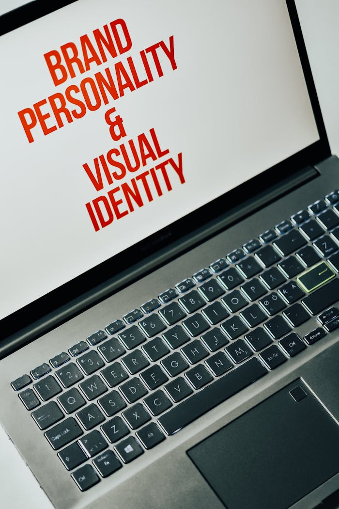 services-04 Laptop screen showing text on brand personality and visual identity for marketing strategy.
